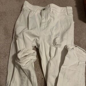 white hollister ripped jeans